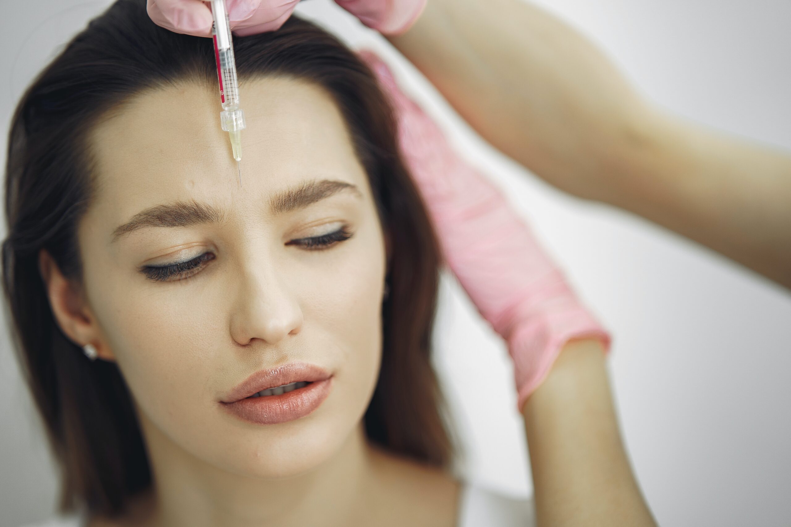 woman-getting-a-face-botox-3985311